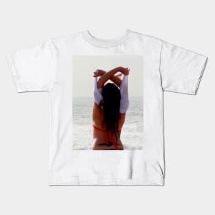 Girl at the beach getting ready for a bath Kids T-Shirt